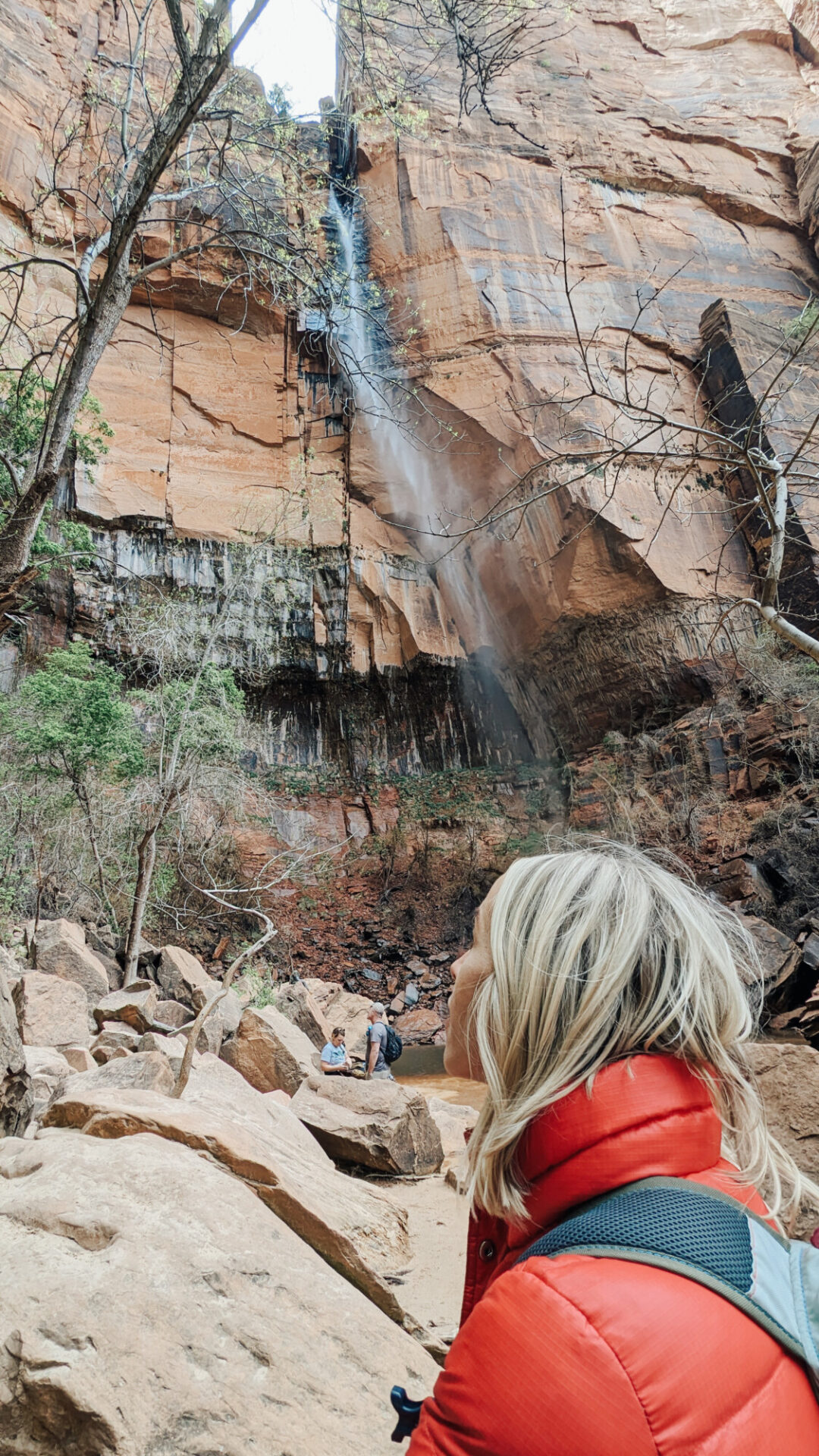 women taking a glaze at zion mountains
